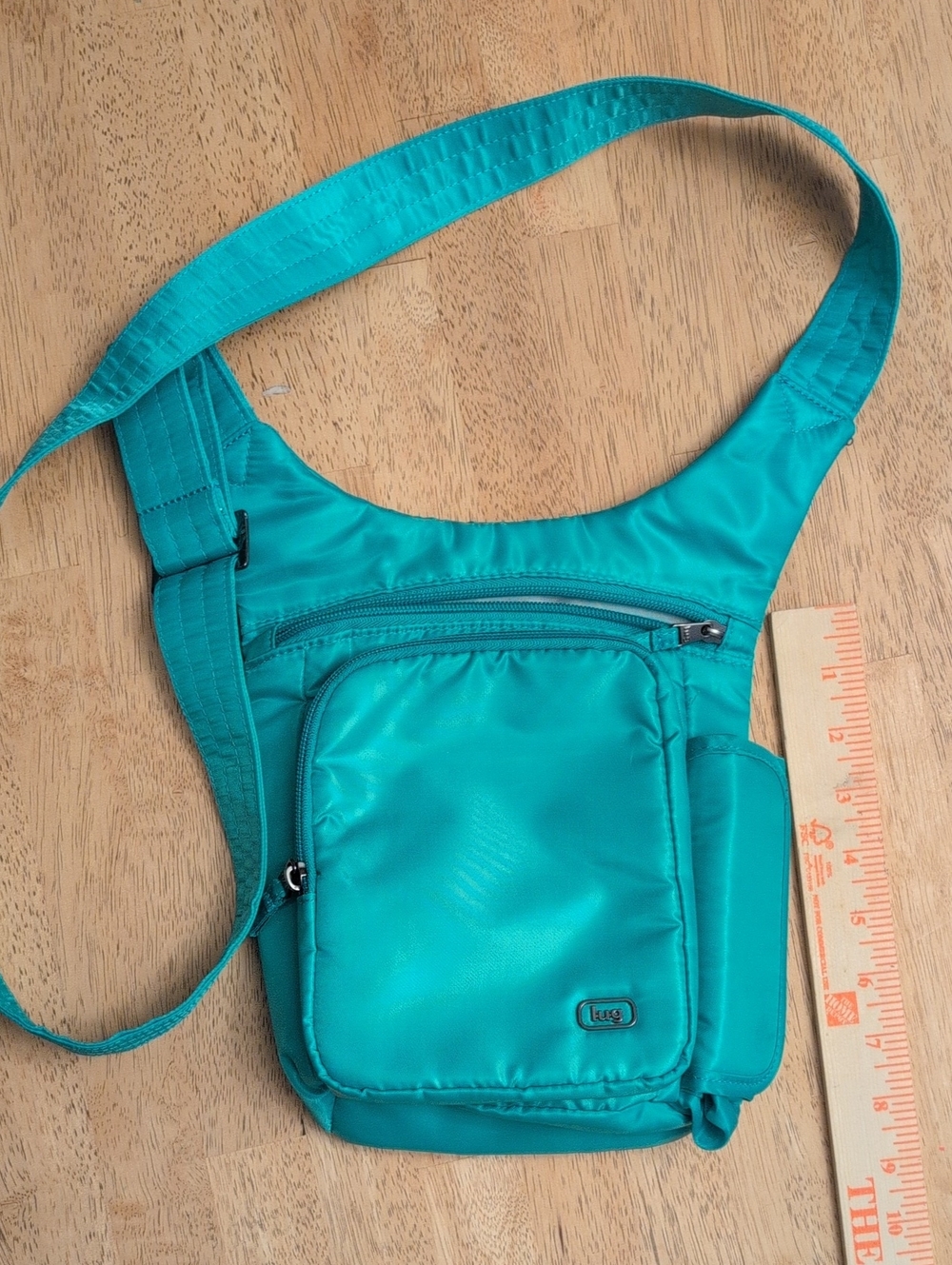 Lug Pivot Oasis Teal Crossbody Sling Bag with Water Bottle Holder - Picture 5 of 9